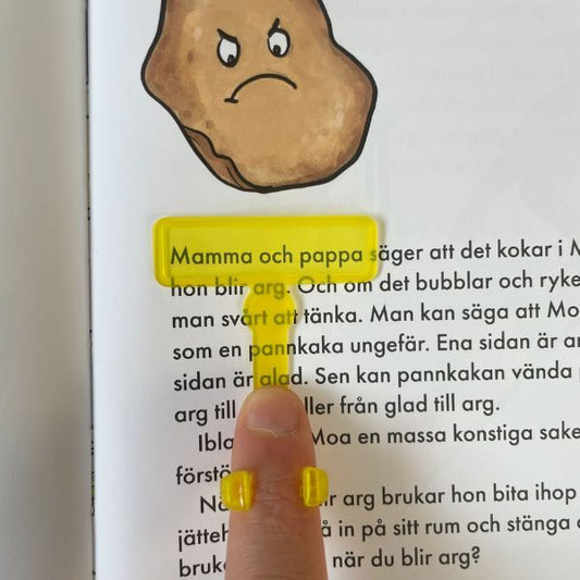 Gult läsfönster fokuserar på vald rad och underlättar läsningen för NPF.