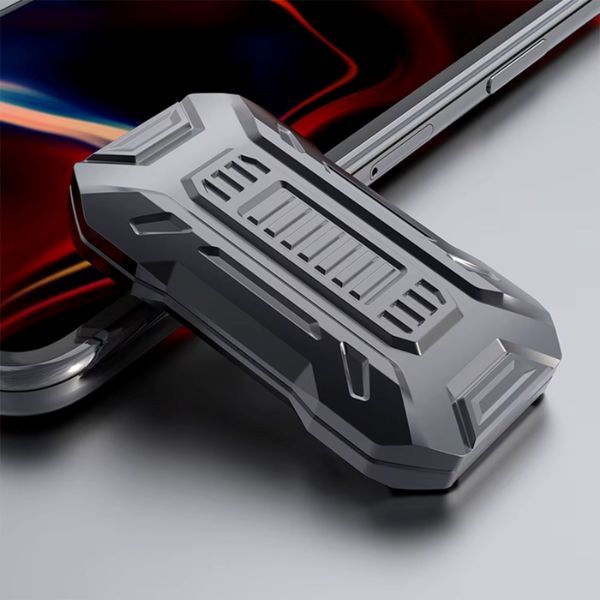 Magnetisk Infinity Slider i grått placerad bredvid mobiltelefon