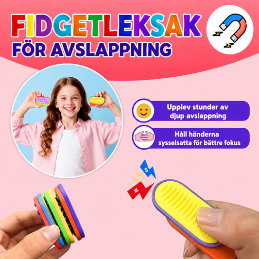 Sex fidgetplattor staplade på varandra och en gul platta i handen, magneterna håller ihop plattorna.