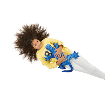 Barn vilar med blå Manimo Tyngdödla, tyngddjur för lugn, återhämtning och sensoriskt stöd.