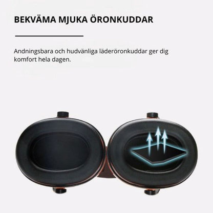 Orange hörselkåpa i närbild, bekväm passform och mjuka kuddar.