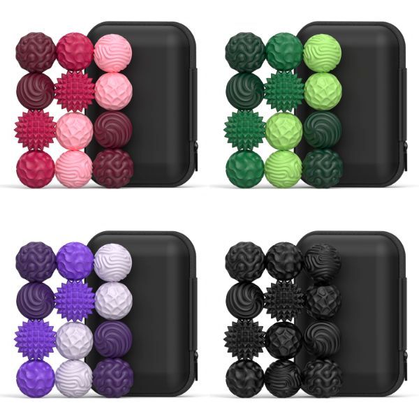 Fidgetbollar i fyra färger – röd, grön, lila och svart. Magnetiska bollar för fokus, lugn och taktil stimulans.