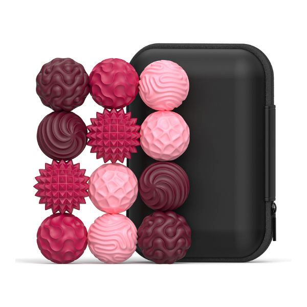 Röda och rosa magnetiska fidgetbollar med fodral. Perfekta för sensorisk träning och lugnande aktiviteter.