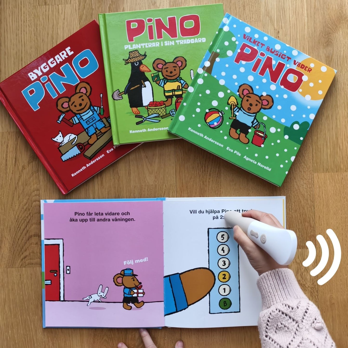 Barn använder Readioo läspenna i boken Pino och paketet, interaktiv lässtund med ljud och bilder.