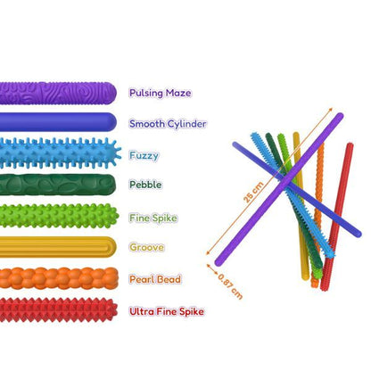 Åtta olika fidgetstavar med unika taktila texturer i klara färger