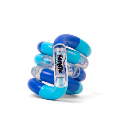 En sensorisk fidget-leksak i blå nyanser med genomskinliga detaljer. Perfekt för att minska stress och öka fokus.