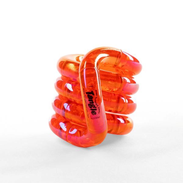 En gnistrande orange fidgetleksak för stresshantering och kreativ stimulans.