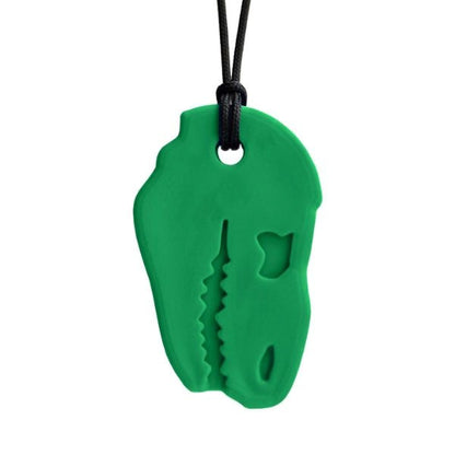 Grönt Dino-Bite tugghalsband med detaljerat dinosauriemönster.
