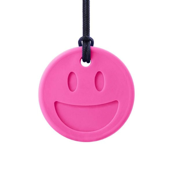 Rosa Smiley Face-tugghalsband för mild sensorisk stimulans.